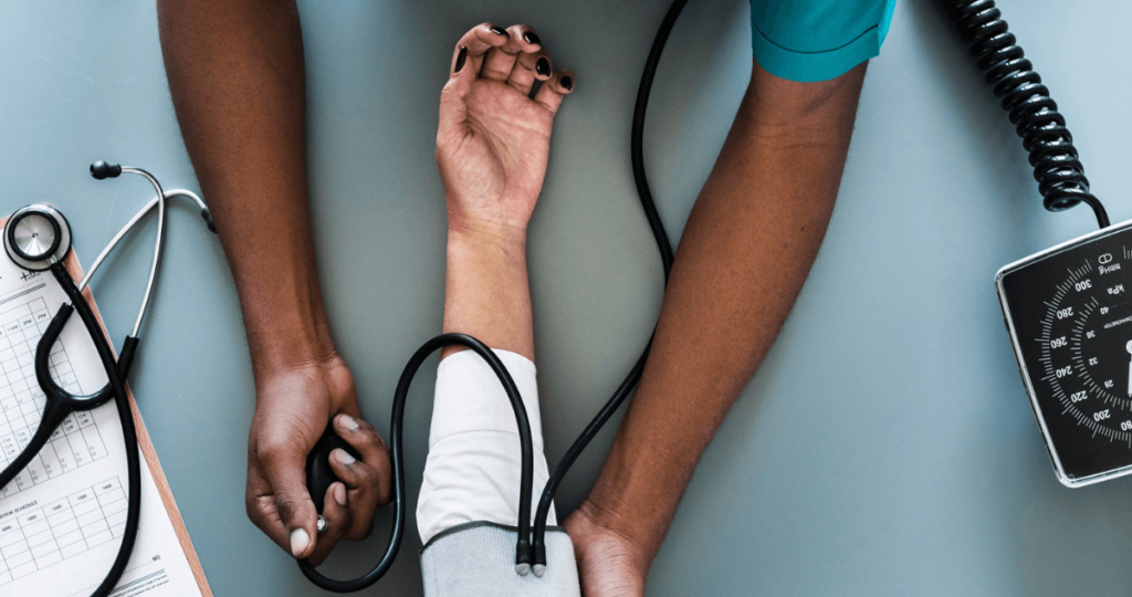 nurse measuring blood pressure