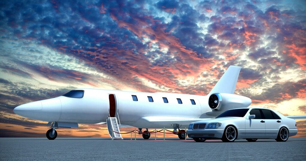 Private jet on a tarmac with a fancy car in front of it.